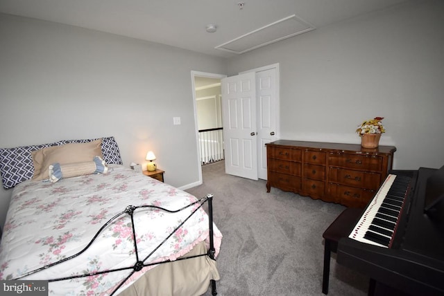 bedroom featuring baseboards and carpet