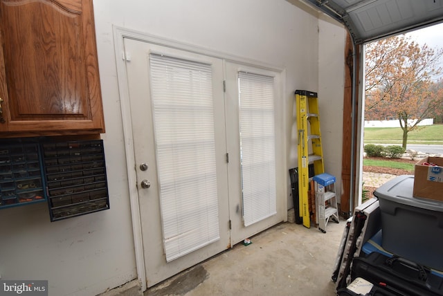 entryway with unfinished concrete floors