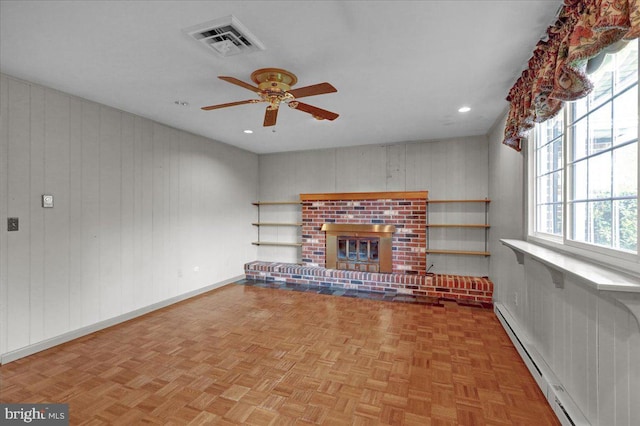unfurnished living room featuring a baseboard radiator, visible vents, baseboards, a fireplace, and a ceiling fan