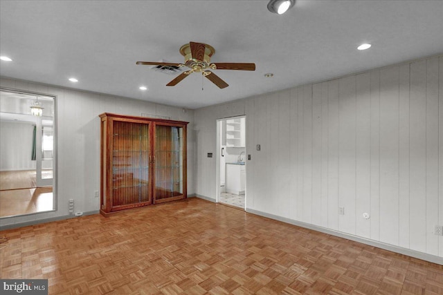 interior space with recessed lighting and baseboards