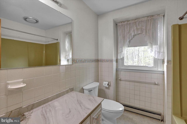 full bathroom featuring baseboard heating, tile walls, toilet, vanity, and a shower