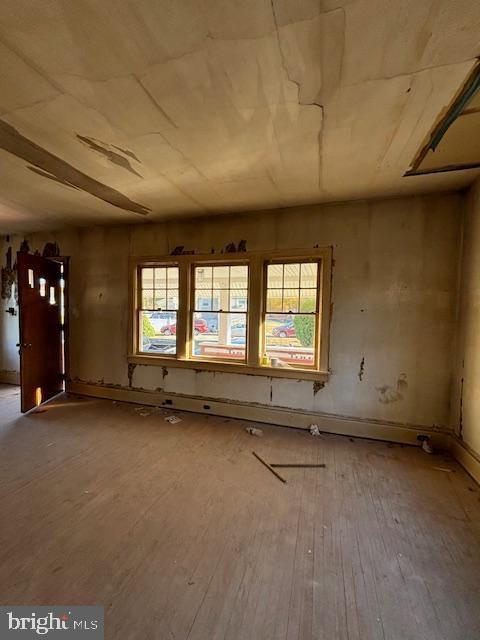 miscellaneous room with wood-type flooring