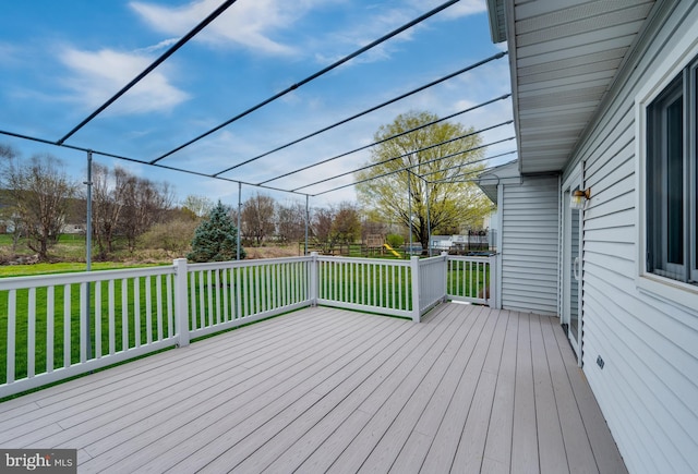wooden deck with a yard