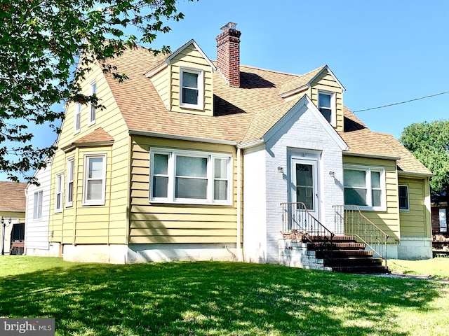 161 E Ave, Woodstown, NJ 08098 - view of front facade featuring a chimney, a front lawn, and a shingled roof