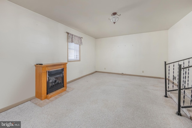 161 E Ave, Woodstown, NJ 08098 - unfurnished living room featuring carpet floors, a fireplace with flush hearth, and baseboards