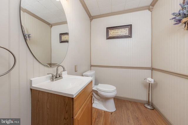 161 E Ave, Woodstown, NJ 08098 - half bath with wood finished floors, crown molding, toilet, and vanity