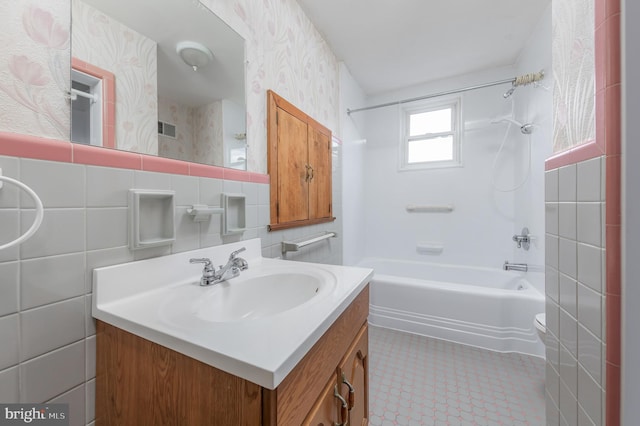 161 E Ave, Woodstown, NJ 08098 - full bath featuring wallpapered walls, bathtub / shower combination, vanity, and tile walls