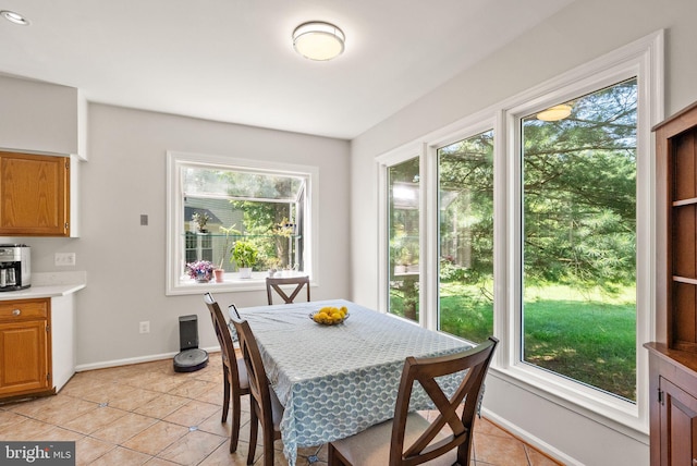20665 Shoal Pl, Sterling, VA 20165 - dining space with baseboards and light tile patterned floors