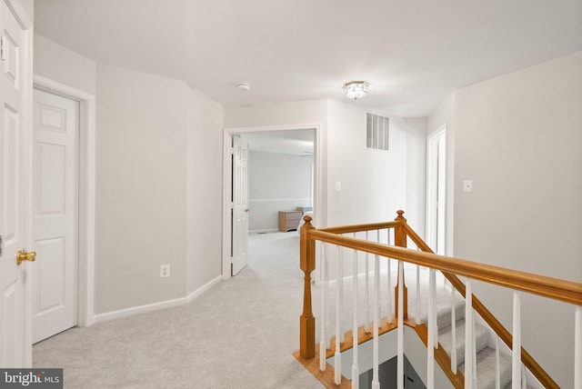 20665 Shoal Pl, Sterling, VA 20165 - hall with an upstairs landing and carpet flooring