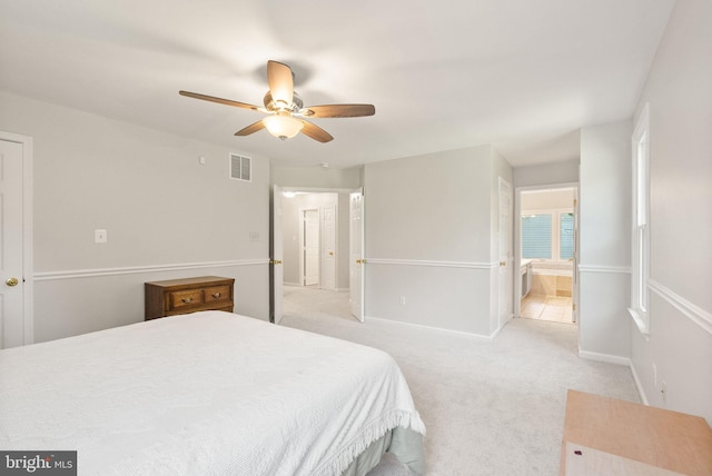 20665 Shoal Pl, Sterling, VA 20165 - bedroom with light carpet, connected bathroom, and ceiling fan