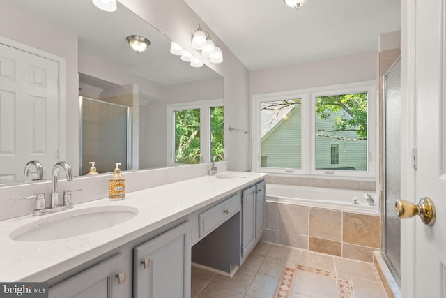 20665 Shoal Pl, Sterling, VA 20165 - full bathroom with plenty of natural light, a stall shower, double vanity, and a garden tub