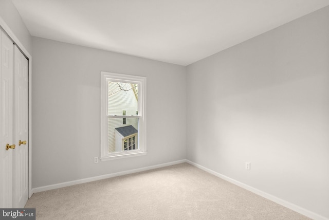 20665 Shoal Pl, Sterling, VA 20165 - unfurnished bedroom featuring light carpet and a closet