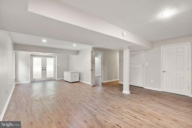 20665 Shoal Pl, Sterling, VA 20165 - basement featuring french doors, light wood finished floors, and recessed lighting