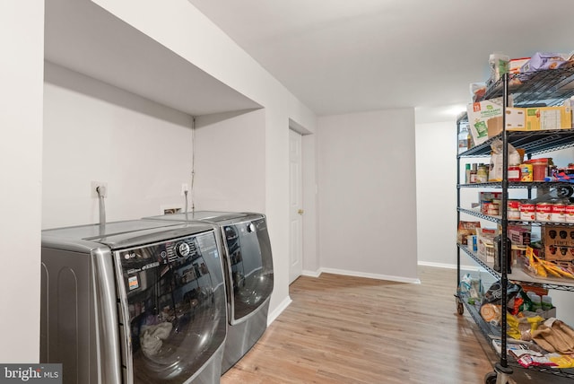 20665 Shoal Pl, Sterling, VA 20165 - laundry room with separate washer and dryer and wood finished floors