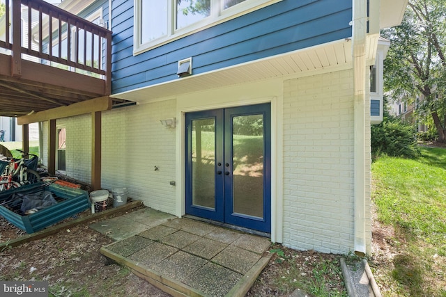 20665 Shoal Pl, Sterling, VA 20165 - entrance to property with french doors, brick siding, and a deck