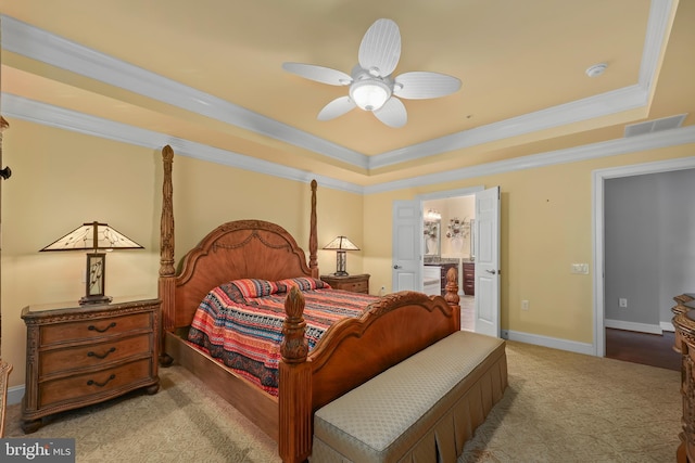 bedroom featuring crown molding, a raised ceiling, baseboards, and visible vents