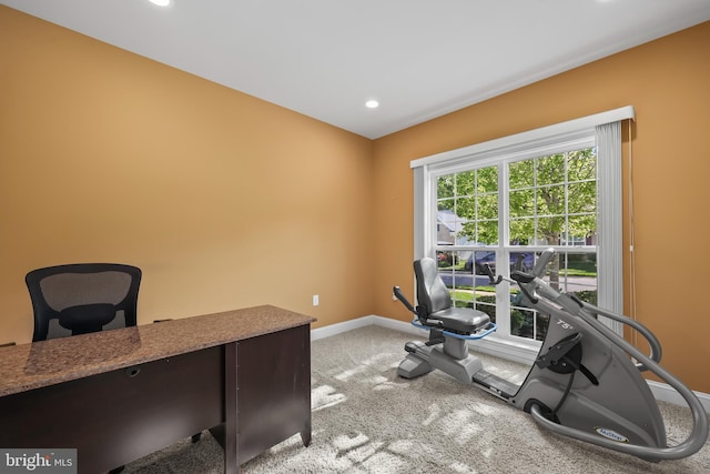carpeted office space with baseboards and recessed lighting