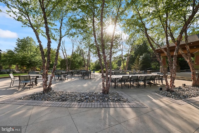 view of patio featuring outdoor dining area
