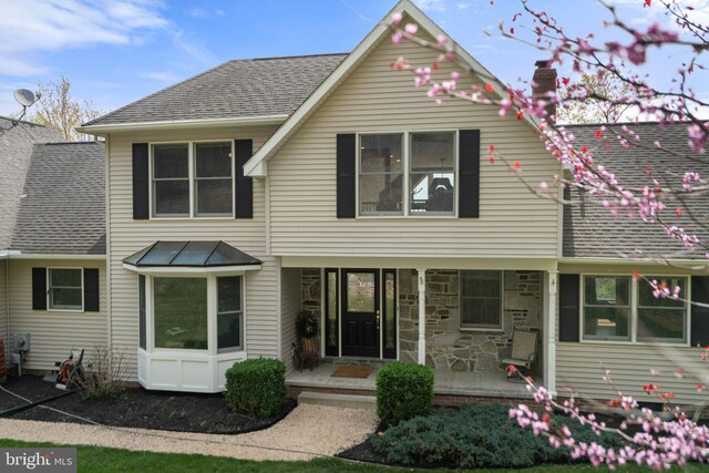 9831 Fox Rd, Frederick, MD 21702 - traditional home featuring a chimney and a shingled roof