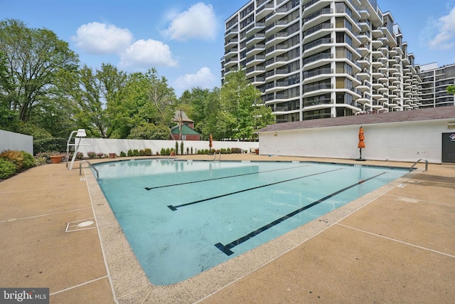 pool featuring fence