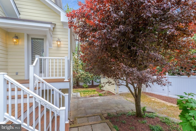 exterior space with a patio and fence