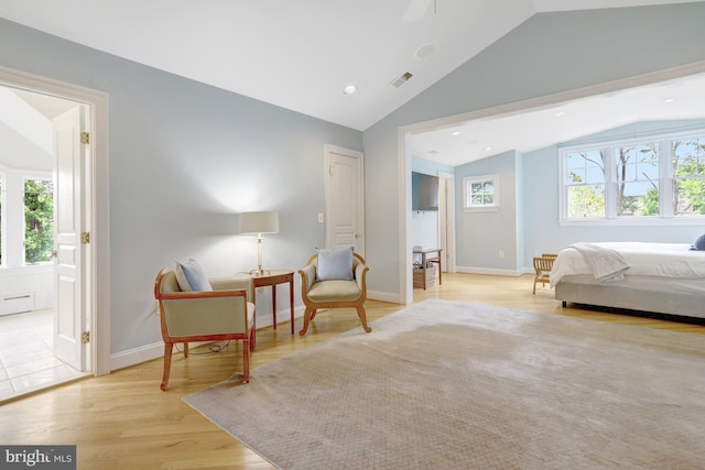 bedroom featuring visible vents, vaulted ceiling, wood finished floors, baseboards, and recessed lighting