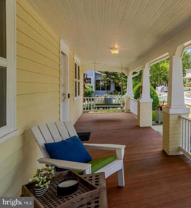 wooden deck featuring a porch