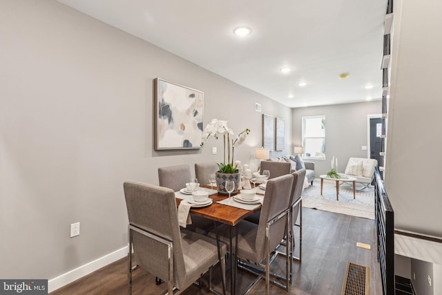 dining space featuring recessed lighting, baseboards, dark wood finished floors, and visible vents