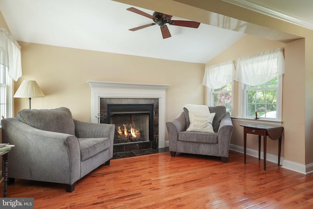 145 Palmer, Ewing, NJ 08618 - living area featuring a ceiling fan, vaulted ceiling, wood finished floors, a tile fireplace, and baseboards