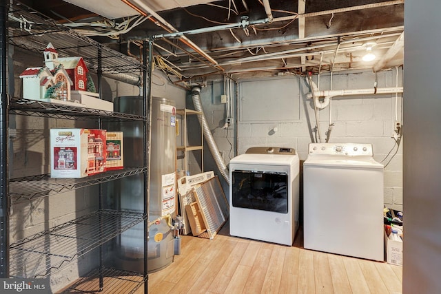 145 Palmer, Ewing, NJ 08618 - washroom with laundry area, washing machine and dryer, wood finished floors, water heater, and concrete block wall