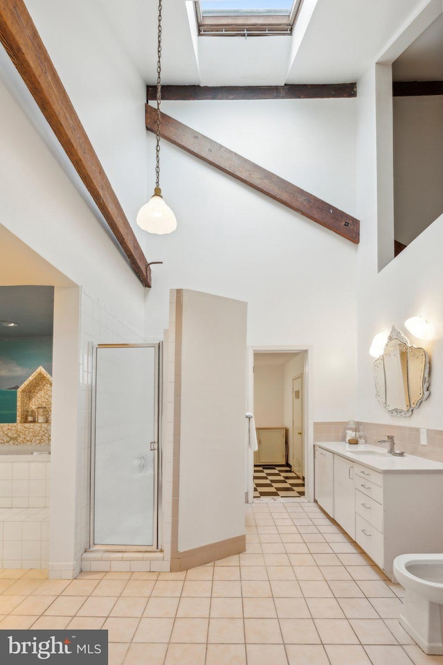 111 Quincy Pl NE Unit 1, Washington, DC 20002 - bathroom with a high ceiling, vanity, a shower stall, toilet, and beam ceiling