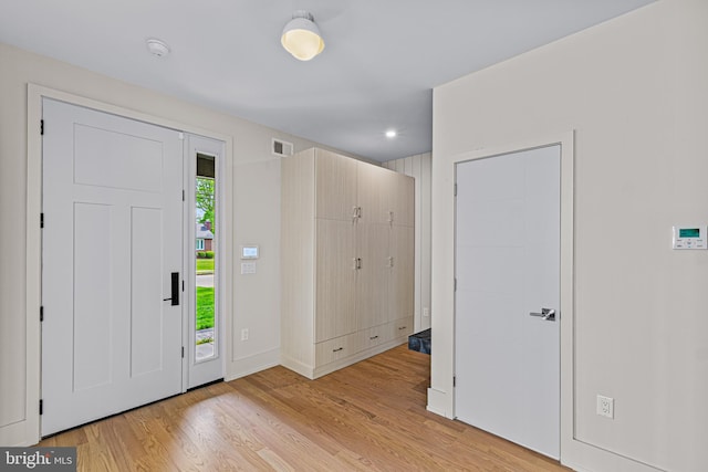 300 Ewing St, Princeton, NJ 08540 - foyer with light wood-style flooring, baseboards, and recessed lighting
