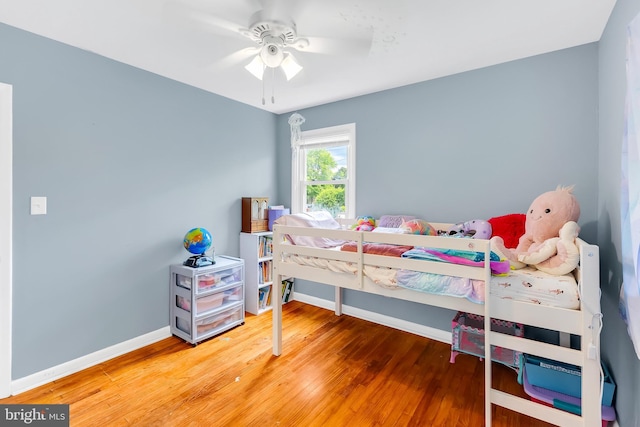 9 Central Ave, Pocomoke City, MD 21851 - bedroom featuring wood finished floors, baseboards, and a ceiling fan