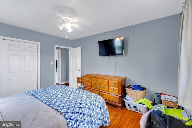 9 Central Ave, Pocomoke City, MD 21851 - bedroom with wood finished floors, a closet, and a ceiling fan