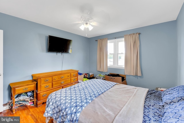 9 Central Ave, Pocomoke City, MD 21851 - bedroom with wood finished floors and a ceiling fan