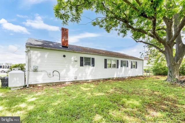 9 Central Ave, Pocomoke City, MD 21851 - back of house with a chimney