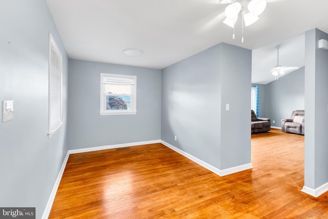 9 Central Ave, Pocomoke City, MD 21851 - spare room with a ceiling fan, baseboards, and wood finished floors
