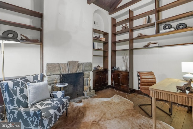 8300 Cedar Rd, Elkins Park, PA 19027 - office space with visible vents, wood finished floors, lofted ceiling with beams, and a fireplace
