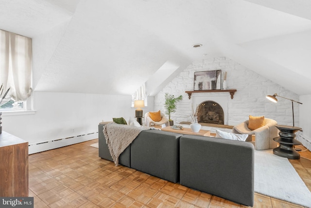 8300 Cedar Rd, Elkins Park, PA 19027 - living area featuring a baseboard heating unit, lofted ceiling, and a fireplace with raised hearth