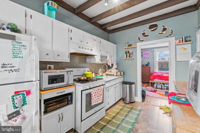 kitchen featuring open shelves, white appliances, under cabinet range hood, and backsplash