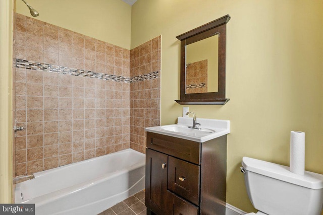 full bathroom with toilet, tile patterned floors, shower / bathtub combination, and vanity
