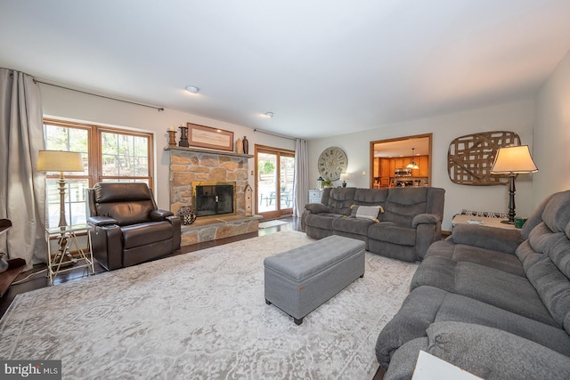 living room featuring a fireplace