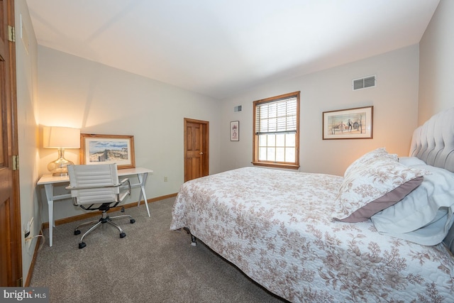 carpeted bedroom featuring visible vents, baseboards, and vaulted ceiling