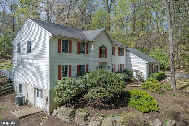 colonial home with cooling unit