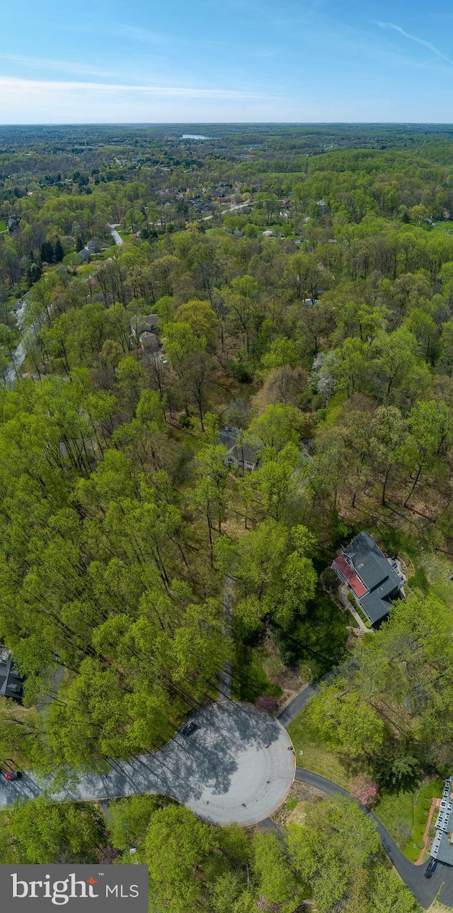 drone / aerial view with a forest view