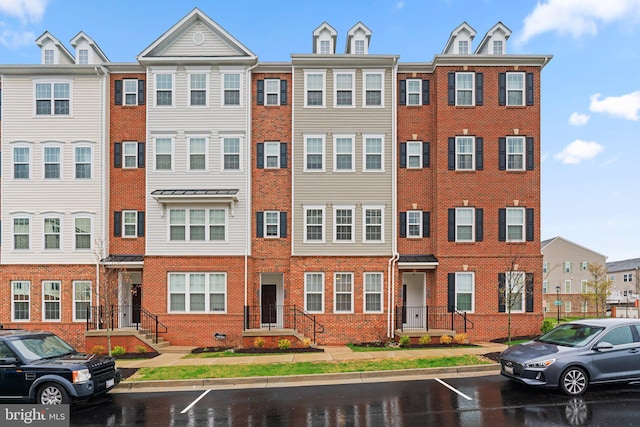 9451 James Macgowan Ln, Owings Mills, MD 21117 - view of property featuring uncovered parking