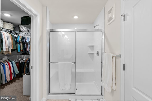 9451 James Macgowan Ln, Owings Mills, MD 21117 - full bathroom with recessed lighting, a stall shower, and a walk in closet