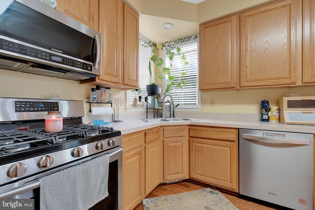 2362 Sequoia Grove St, Waldorf, MD 20601 - kitchen featuring appliances with stainless steel finishes, a sink, and light brown cabinets