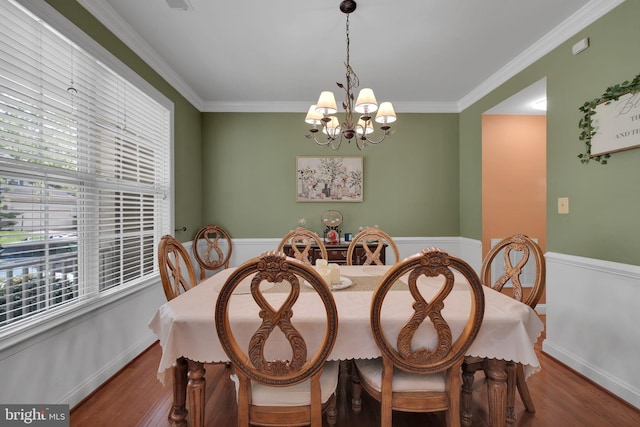 2362 Sequoia Grove St, Waldorf, MD 20601 - dining room with ornamental molding, wood finished floors, and a notable chandelier