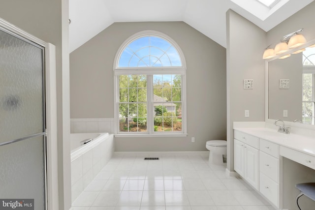 full bathroom featuring a wealth of natural light, visible vents, vanity, and lofted ceiling with skylight